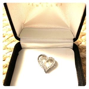 Heart shaped diamond pendant from Kay Jewelers.